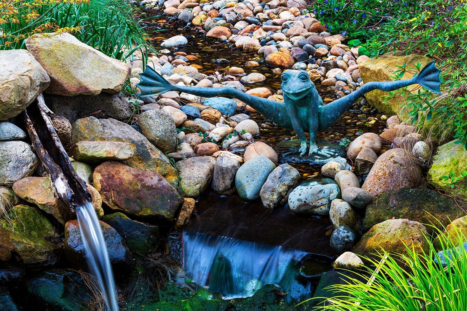 Frog Sculpture Near a Pond